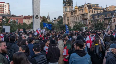 Crowd in Batumi, Georgia protesting with Georgian flags