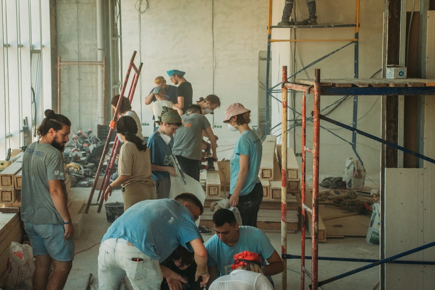 Young people working at a construction site