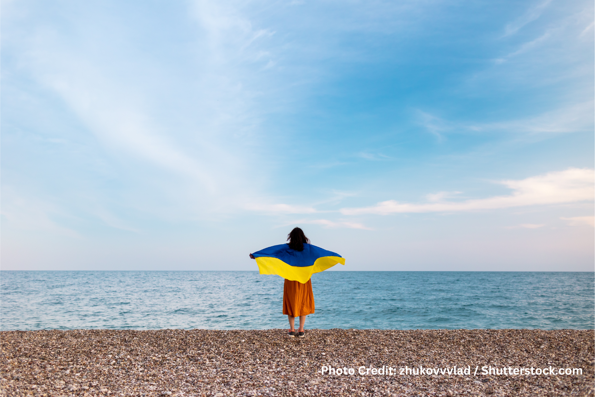 Girl standing in front of ocean 