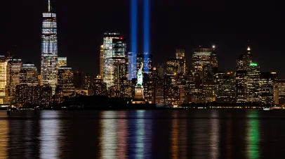 9/11 Memorial Lights with Statue of Liberty