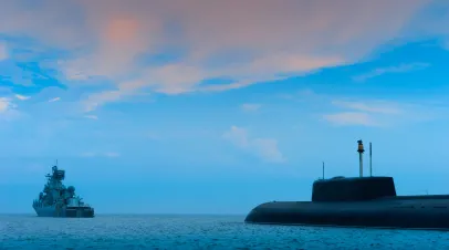 Submarine Following Navy Ship