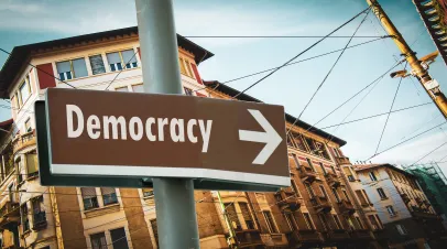 Street Sign the Direction Way to Democracy