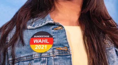 Young woman with Vote 2021 button