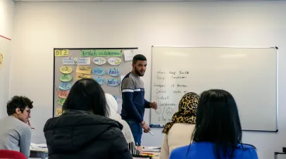 Migrants from Africa, Asia, and the Middle East learn German in the class of the international school Inlingua in Halle (Saale), Germany.