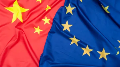 Real natural fabric flag of China or National Flag of the People's Republic of China and EU European Union flag as texture or background