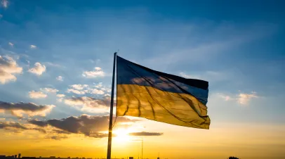 Ukrainian flag in front of sunset