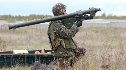 A soldier with MANPADS Igla-1 in firing position