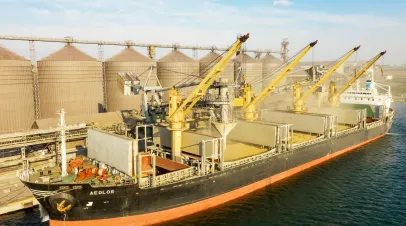 ODESSA, UKRAINE: Loading grain into holds of sea cargo vessel