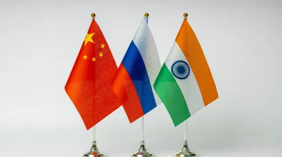 National flags of China, Russia and India on a light background.