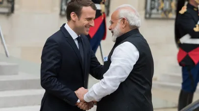 The President of France Emmanuel Macron welcoming the Prime Minister of India Narendra Modi at Elysee Palace