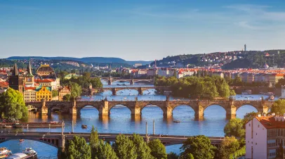 Panoramic view of the Old Town pier architecture and Charles Bridge over the Vltava River in Prague, Czech Republic