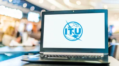 Laptop computer displaying logo of The International Telecommunication Union, a specialized agency of the UN responsible for information and communication technologies