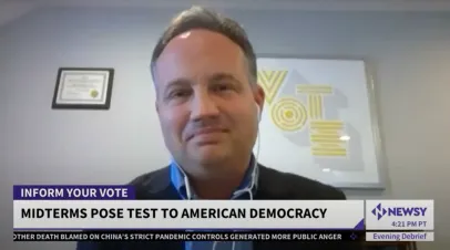 David Levine on Newsy. Chyron reads midterms pose test to American democracy