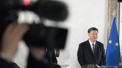 Xi Jinping by an EU flag