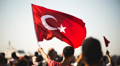 Close up shot of a Turkish flag in the crowded people on the liberty day in Turkey