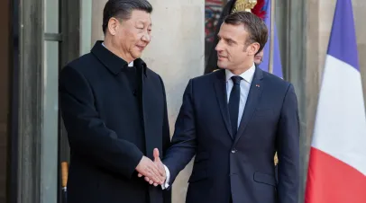 The French president Emmanuel Macron welcoming Chinese President Xi Jinping during his state visit in France at the Elysee Palace.