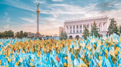 KYIV, UKRAINE - August 23, 2022: Independence Square, with yellow and blue flags, in memory of the fallen defenders of Ukraine during wartime in Ukraine