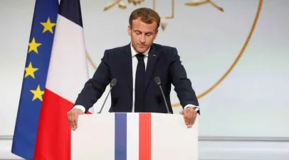 Emmanuel Macron delivers a speech at Élysée Palace in Paris. GONZALO FUENTES/AFP VIA GETTY IMAGES
