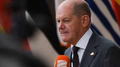 Germany's Chancellor Olaf Scholz speaks to the press as he arrives to attend a European Union Summit with all 27 EU leaders at The European Council Building in Brussels, Belgium, 29 June 2023.