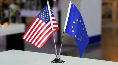 US and EU flags on table