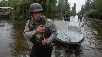 KHERSON, UKRAINE - Jun. 12, 2023: Volunteers actively helping to rescue local residents