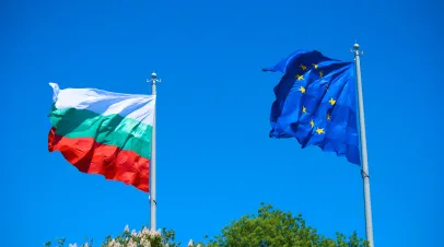Bulgarian and EU flags waving on blue sky