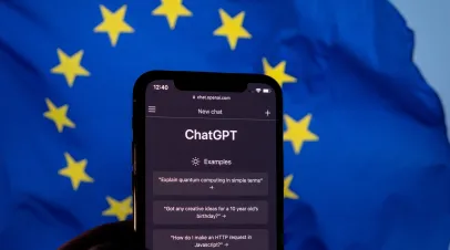EU and AI regulation EU Flag and Chat GPT app