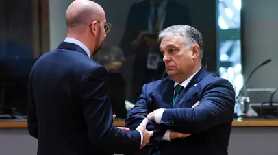 EU Council president Charles Michel (left) confronting Viktor Orban