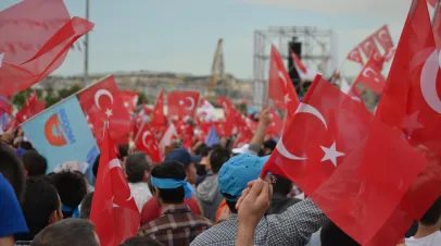 Turkey election rally, crowd waving Turkish flag, 2023
