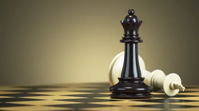 Pair of chess pieces on a board