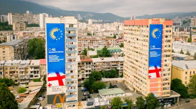 Apartment blocks in Tblisi with large Georgian Dream political party banners