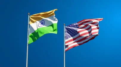 US and indian flags waving side by side