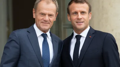 Poland's Donald Tusk poses with French president Emmanuel Macron