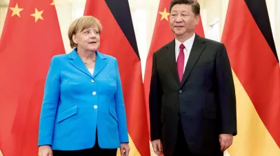 Then German Chancellor Angela Merkel with Chinese President Xi Jinping, Beijing, China, May 24, 2018.