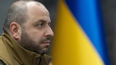 Ukrainian defense ministar Rustem Umerov pictured in front of a Ukrainian flag