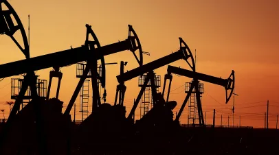 An oil field at sunset