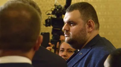 Bulgarian politician Delyan Peevski facing a bank of cameras