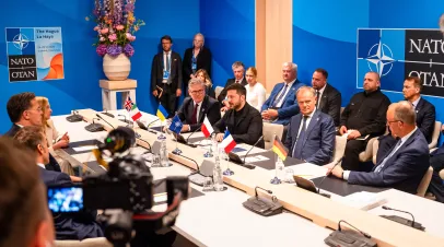 President Zeleneskyy and other leaders seated at a NATO summit table
