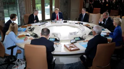 Round table at the G7 summit with Trump and European leaders sitting around it
