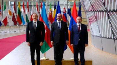 European Council President Charles MICHEL standing with the President of Azerbaijan Ilham ALIYEV and the Prime Minister of Armenia Nikol PASHINYAN