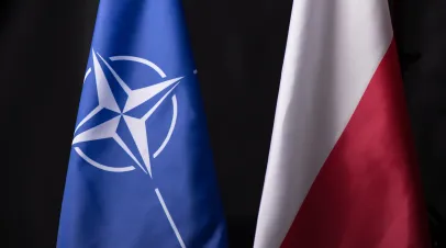Polish and NATO flags next to each other 