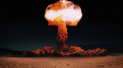 Explosion of a nuclear bomb with a mushroom in the desert. Hydrogen bomb test.