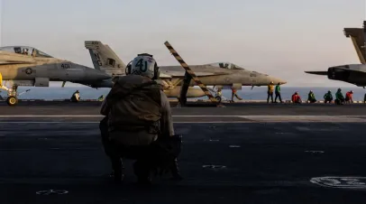  In this U.S. Navy released handout, an F/A-18E Super Hornet, attached to Strike Fighter Squadron (VFA) 14, prepares to take off from the flight deck of Nimitz-class aircraft carrier USS Abraham Lincoln (CVN 72) in support of Operation Epic Fury on March 1, 2026 at Sea. 