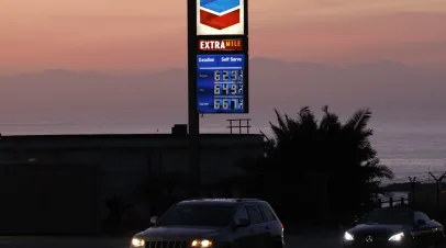 High gas prices are displayed at a Chevron gas station near the Pacific Ocean on April 8, 2026 in El Segundo, California.
