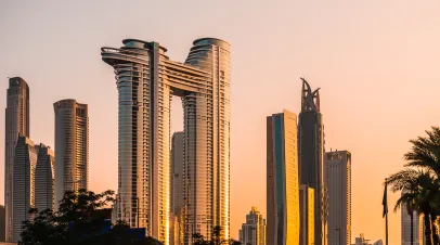 Dubai downtown skyline with modern skyscrapers at sunset. Dubai, United Arab Emirates. 