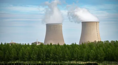 View on cooling towers of NPP, nuclear power plant thermal power station in which heat source is nuclear reactor, France, Europe, cheap energy source, Belleville-sur-Loire