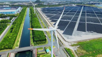 Solar power plant and Windmills aerial view. Renewable energy. Green tech.
