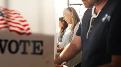 US election day, Senior American woman voting at booth at voting booth at US election station. Us election day. US election day. People vote for American democracy.