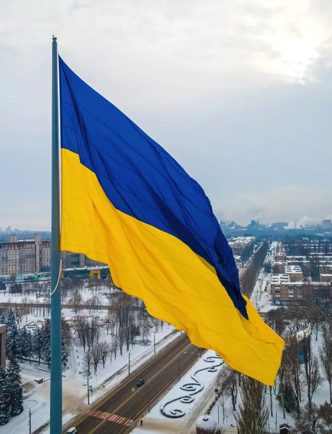 The aerial view of the Ukraine flag in winter