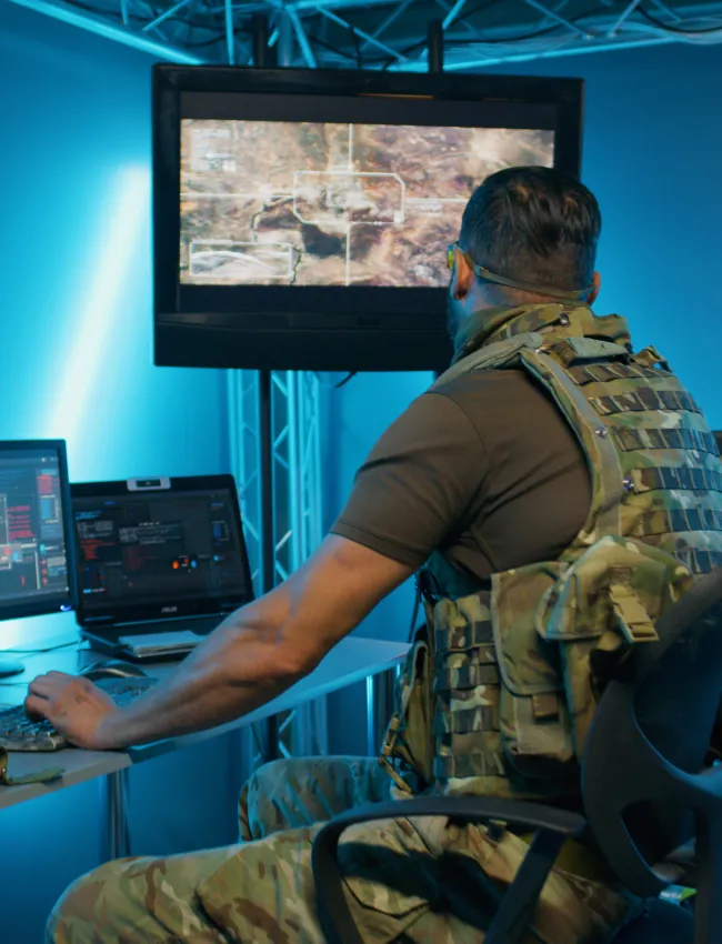 Military men working on computer systems while hiding in secret base of intelligence